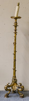 Lot 1220 - A 19th century gilt brass faux bamboo candle...