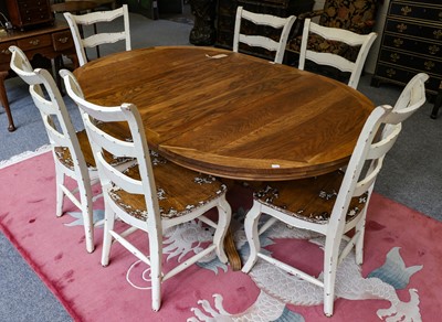 Lot 1140 - A Dutch oak extending pedestal dining table,...