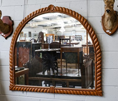 Lot 1267 - A modern carved over mantel mirror with rope...