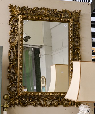 Lot 1232 - A Baroque style gilt frame mirror, the...