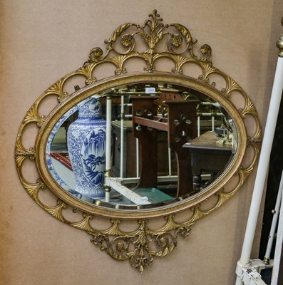 Lot 1243 - An early 19th century gilt framed oval wall...