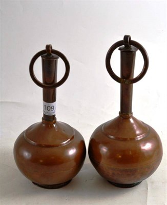 Lot 109 - Pair of copper storage bottles