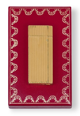 Lot 2228 - A Must de Cartier Gilt Lighter