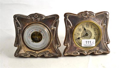 Lot 111 - An Art Nouveau clock and barometer in silver frames (a pair)