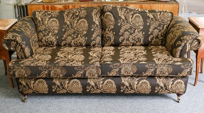 Lot 1181 - A modern upholstered scroll arm sofa