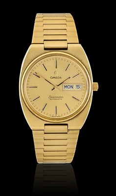 Lot 2359 - Omega: A Gold Plated Automatic Day/Date Centre Seconds Wristwatch