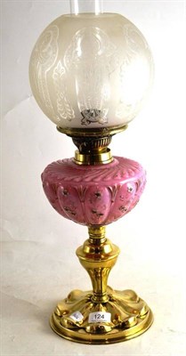 Lot 124 - Pink oil lamp with iris etched shade