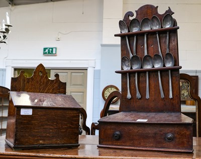 Lot 1292 - An 18th-century carved oak spoon rack, housing...