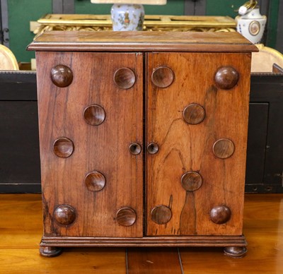 Lot 1194 - A 19th-century rosewood miniature chest, the...