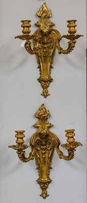 Lot 1254 - A pair of 19th-century gilt bronze twin light...