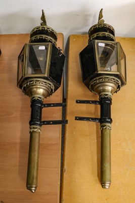 Lot 364 - A pair of period style black painted and brass...