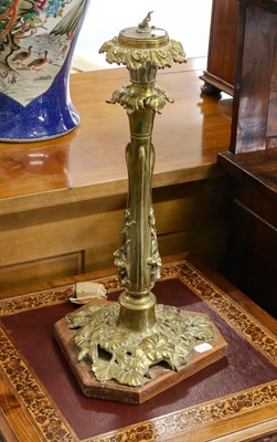 Lot 1198 - An Art Noveau gilt brass table lamp, cast with...