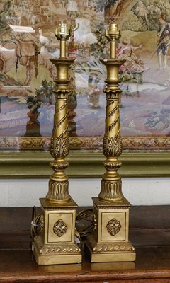 Lot 1217 - A pair of gilt painted plaster columnar form...