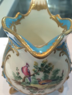 Lot 200 - A Sevres three-footed cream jug, 19th century,...