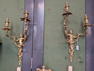 Lot 1256 - A pair of 19th-century style gilt metal twin...