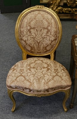 Lot 1200 - A pair of French Louis XVI style gilt chairs