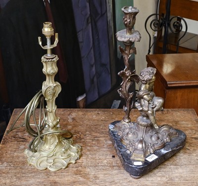 Lot 1241 - A 19th-century gilt metal figural candle stick...