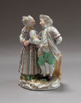 Lot 227 - A Meissen figure group, a lady and gent...