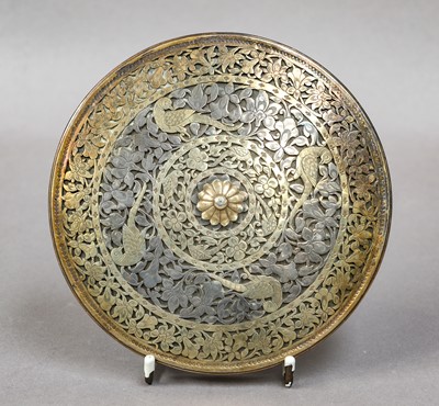 Lot 277 - An Indian brass and silver disc shaped box,...