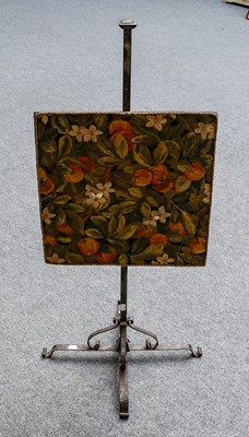 Lot 1139 - A wrought iron pole/fire screen with...