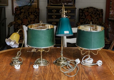 Lot 1141 - A pair of brass table lamps with green shades,...