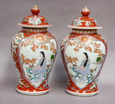 Lot 176 - A pair of Japanese baluster-shaped jars and...