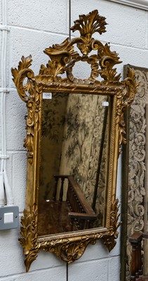 Lot 1245 - A 19th century gilt-framed mirror decorated...