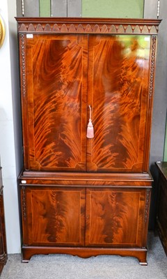 Lot 1259 - A reproduction mahogany cocktail cabinet, 88cm...