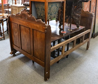 Lot 1277 - A French-carved walnut bedstead, 121cm by...