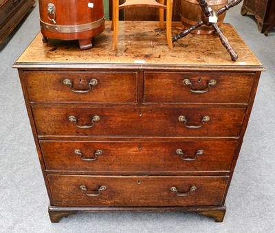 Lot 1284 - A George III oak straight front chest of...