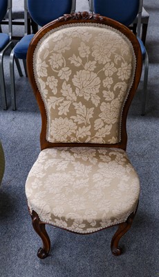 Lot 1186 - A Victorian rosewood nursing chair with floral...