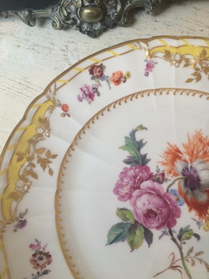Lot 115 - A Berlin porcelain plate with yellow borders...