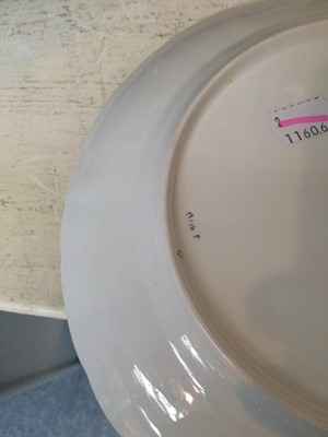Lot 115 - A Berlin porcelain plate with yellow borders...