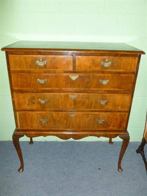 Lot 1193 - A Walnut and Crossbanded Five Drawer Straight Front Chest, of two short over three long...