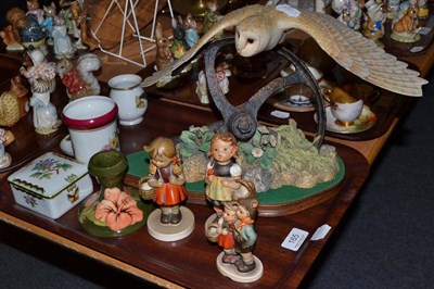 Lot 165 - A tray of ceramics including a Moorcroft candlestick, three Hummel figures, Border Fine Arts...