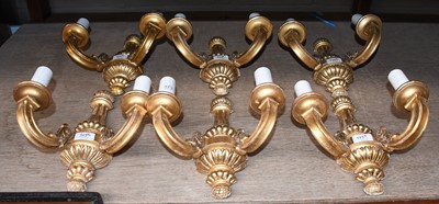 Lot 373 - A set of six gilt twin-light reproduction wall...