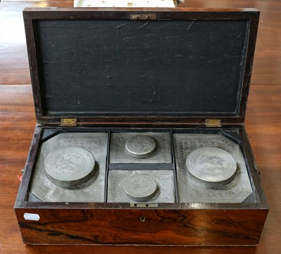 Lot 360 - A Regency rosewood tea caddy, fitted with four...