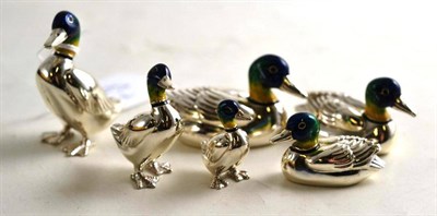 Lot 171 - A graduated set of three silver and enamel ducks and three standing examples (all stamped 925), the