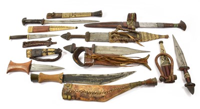 Lot 2329 - Three Central African Arm Knives, each with...