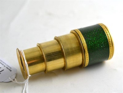 Lot 179 - A brass and enamel triple draw monocular