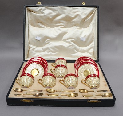 Lot 112 - A cased Royal Worcester coffee set with silver...
