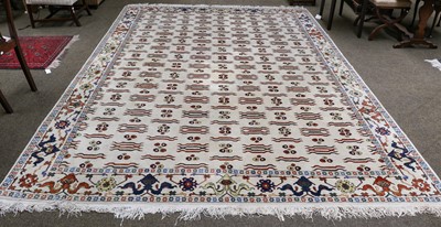 Lot 1088 - Turkish carpet of Cintamani design, the ivory...