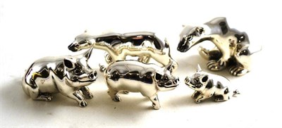 Lot 186 - Two silver polar bears, the largest 4cm tall and three pigs (all stamped 925)