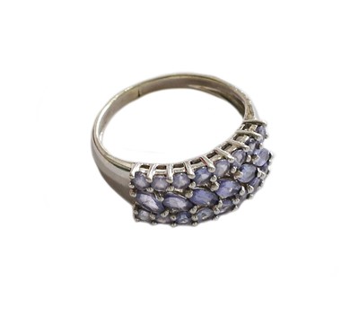 Lot 231 - A tanzanite ring, stamped '9K', finger size Q