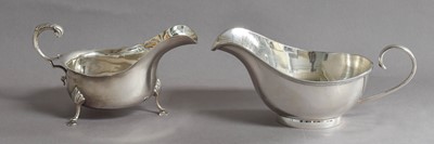 Lot 9 - An Edward VII and a George V Silver Sauceboat,...
