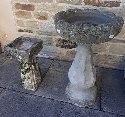 Lot 1111 - A weathered composition stone bird bath, 47cm...