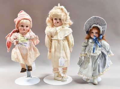 Lot 286 - Circa 1910 and 1920s dolls comprising and...