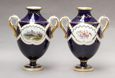 Lot 139 - A pair of Mintons twin-handled pedestal vases,...