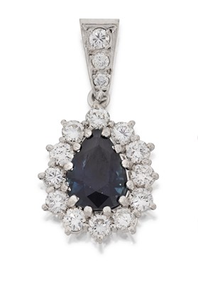 Lot 2102 - A Sapphire and Diamond Cluster Pendant