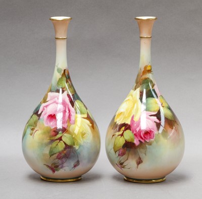 Lot 96 - A pair of Royal Worcester bottle vases, 22cm high